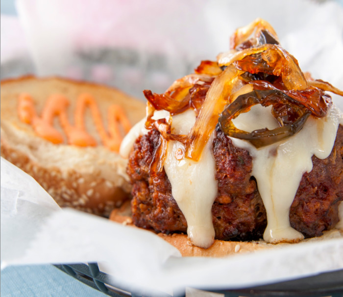 Burgers With Caramelized Onions, Jalapeño Relish And Red Pepper Mayonnaise Recipe