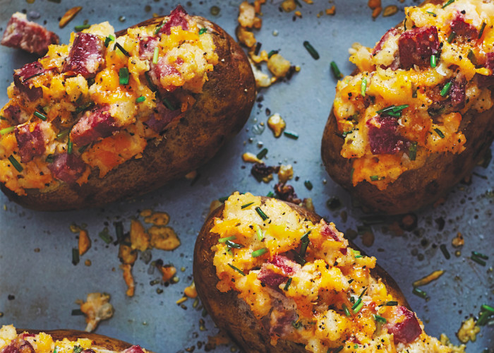Corned beef, cheddar cheese and chives turn ordinary potatoes into party potatoes.