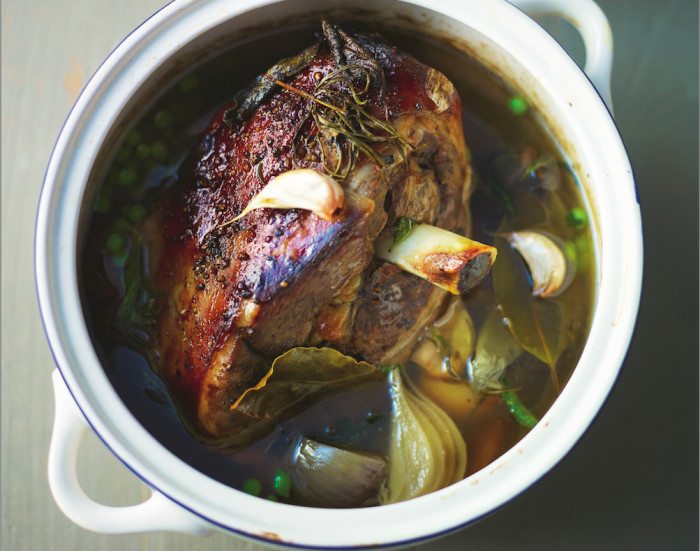 Good wine and slow cooking will make your lamb irresistibly tender — go ahead, grab a leg!