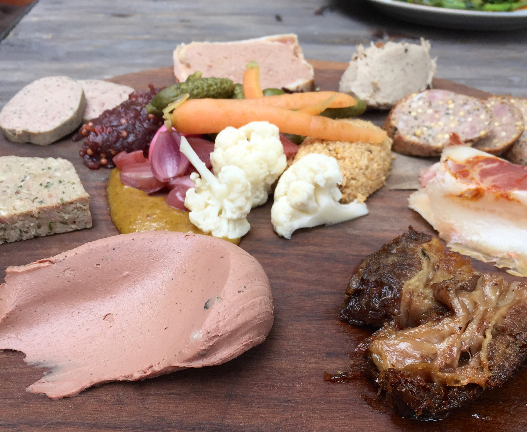 Kris Morningstar's Charcuterie Board Is One Lucky Piece Of Wood Food