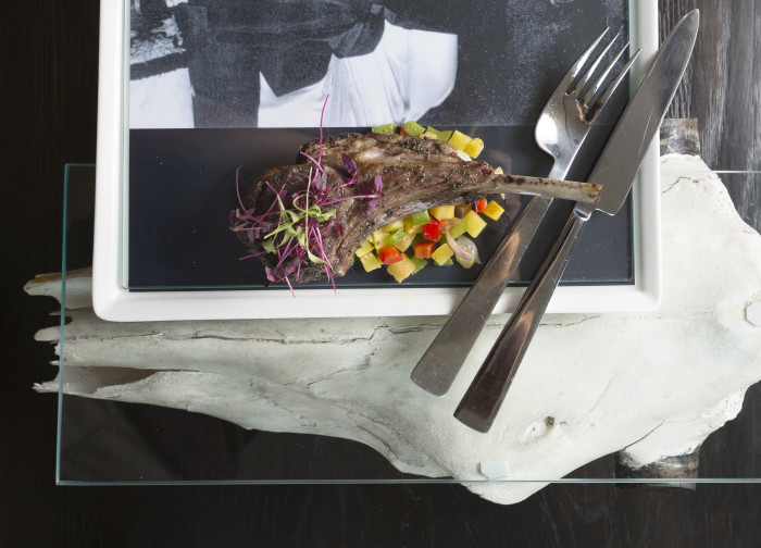 Local artist Larry Swan created ceramic trays and glass and cow skull platters for “O’Keeffe’s Table” at Eloisa in Santa Fe. (Photo credit: Gabriella Marks Photography)