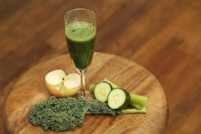 A classic green juice recipe will take you far in life. Just look at that champagne glass. (Photos: Clay Williams.)