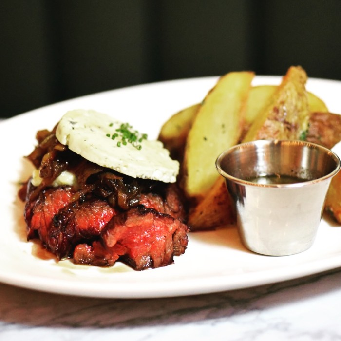 At Syndicated, you can go for the movies and stay for the steak frites.