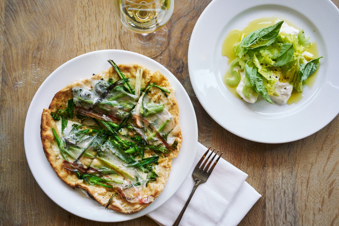 Pizzetta with wild onions, Fontina and arugula & Mozzarella di bufala with celery and olio verde (Please credit Marcus Nilsson)