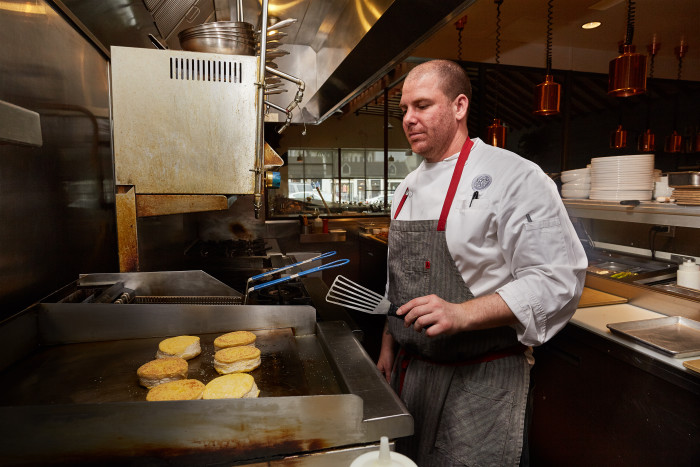 Fiorelli griddles the muffins to add color and texture before they go in the oven.