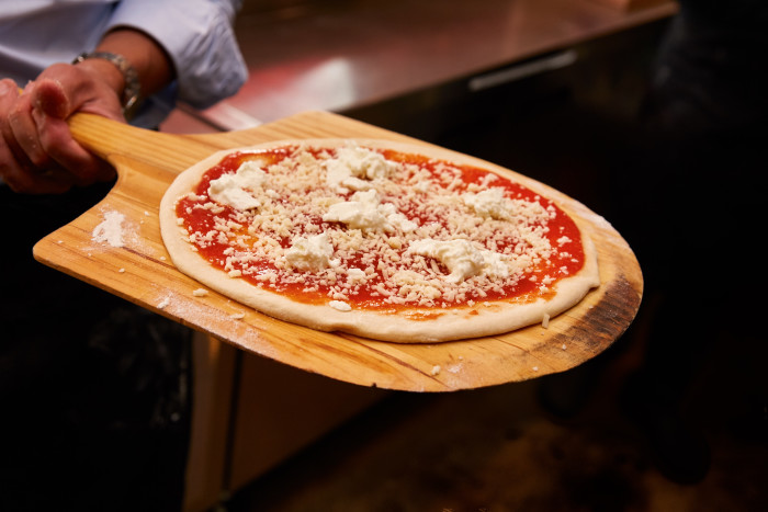 Pizza Romana's Margherita is made with both whole milk and buffalo mozzarella.