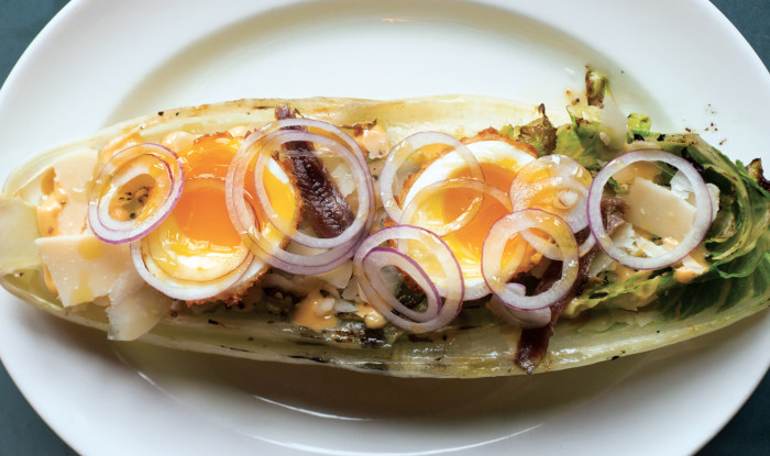 Pair a smoky grilled romaine wedge with homemade Caesar, runny eggs and a spicy kick with your favorite beer or wine.