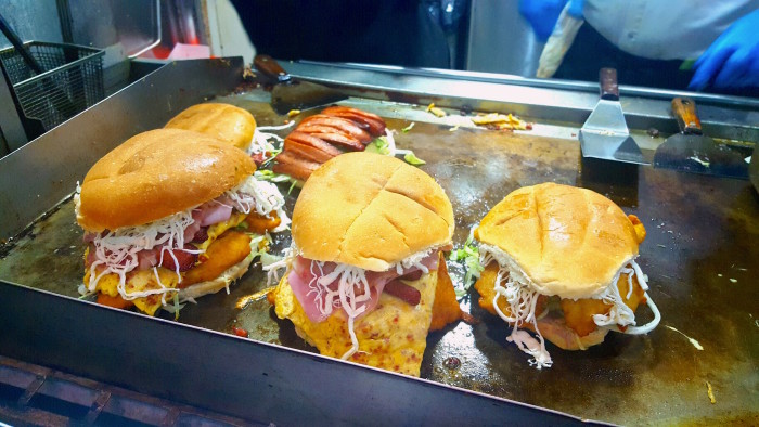 Galdino "Tortas" Neza's signature sandwich, the Tortas Pumas, named for his favorite soccer team, is no joke.