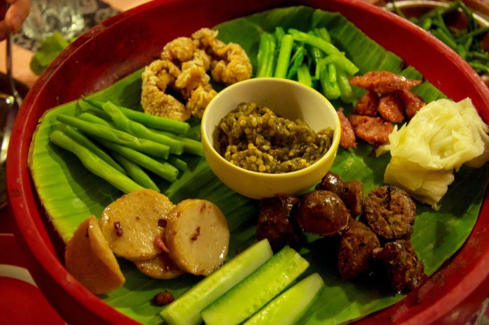 Moo yor on the lower left hand corner of a northern Thai platter.