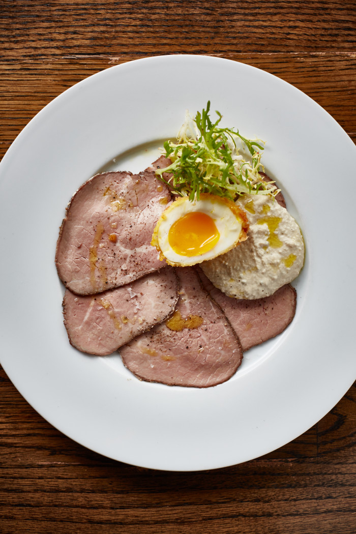 Vitello tonnato, a plate of thinly sliced veal served with a tuna-caper-anchovy dressing, sounds like a mystifying combination — but Grant suggests that one bite will change that. 