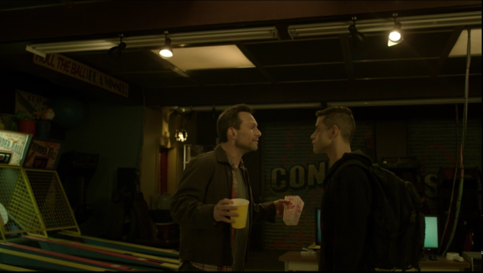 Christian Slater and his popcorn in typical Mr. Robot fashion.