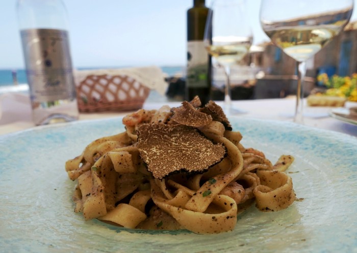 This tagliatelle and shrimp topped with shaved black truffle comes with a view.