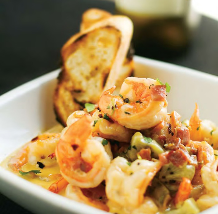 No visit to Soby's New South Cuisine would be complete without the famous shrimp and grits, pimento cheese, or fried green tomatoes. (Photo credit: Soby's New South Cuisine)