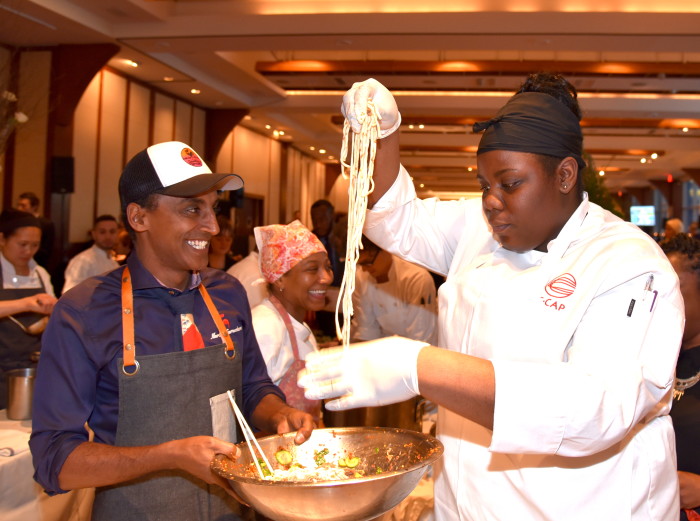 Rather than complain about the staffing issue, chef Marcus Samuelsson says he wants to solve it.