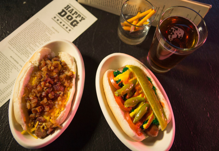 At Happy Dog, there’s 50 toppings (such as SpaghettiOs, Froot Loops, and chunky peanut butter) for your hot dogs. (Photo credit: Happy Dog)