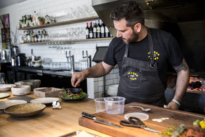 At Tarsan i Jane, Chef Perfecte Rocher prepares Valencian-inspired small plates and stellar paella. (Photo credit: Suzi Pratt)