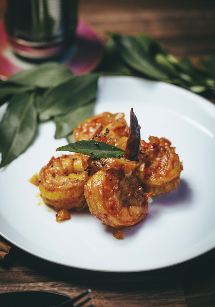 Old Monk serves up spicy prawn balchao inspired by the Western region of India.