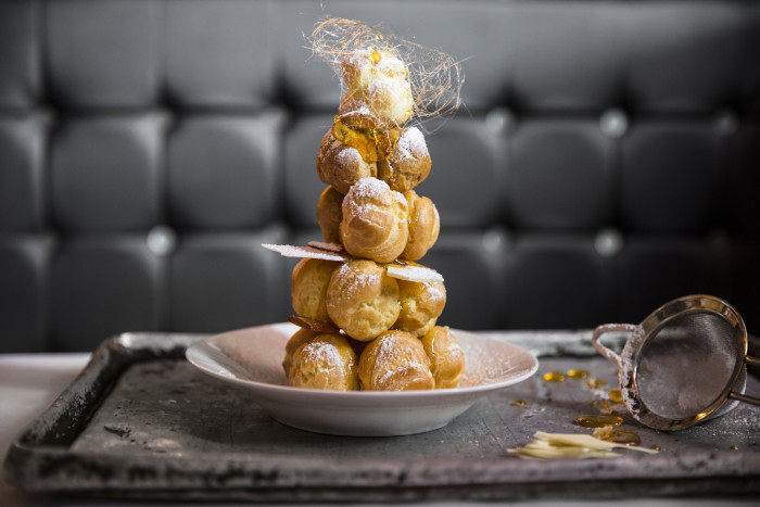 One Fifth's menu has everything, like the classic French croquembouche. (Photo: Julie Soefer Photography.)