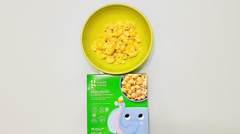 Box of cooked Good & Gather Pasta Shells in Cheddar Cheese Sauce