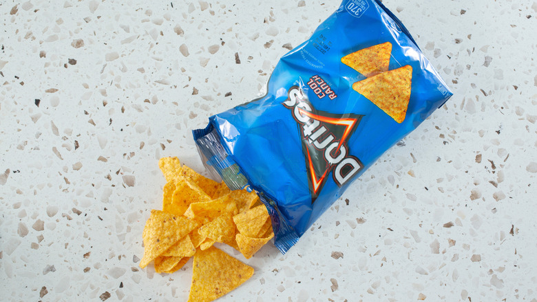 Cool Ranch Doritos spilling out of an open package