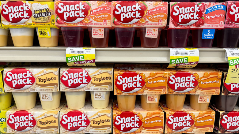 Shelf with assorted flavors of Snack Pack pudding