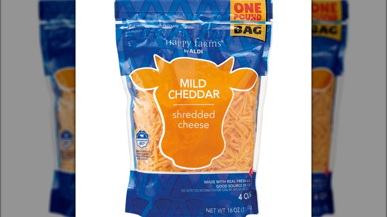 Bag of Happy Farms shredded mild cheddar cheese