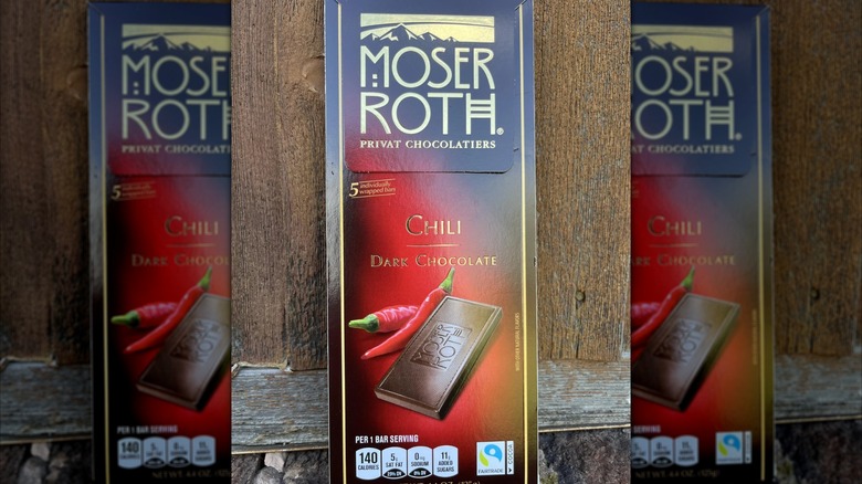 Moser Roth Dark Chili Chocolate Bar on a wooden table