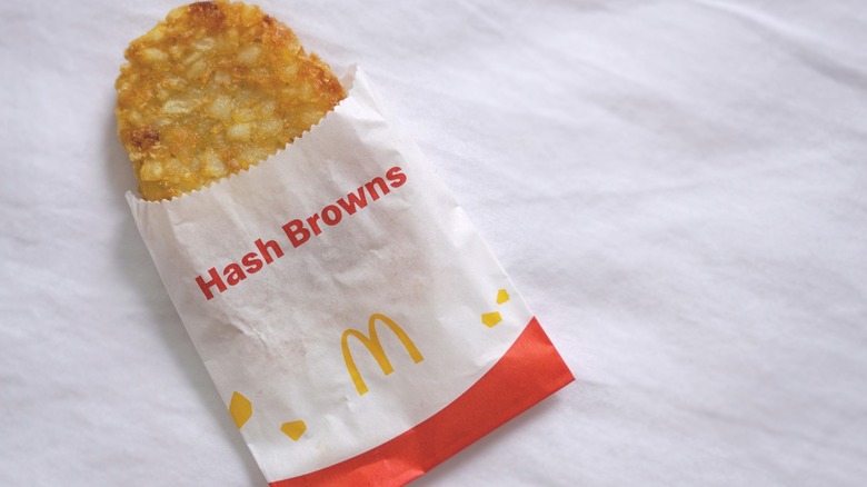 McDonald's hash brown on a bed sheet