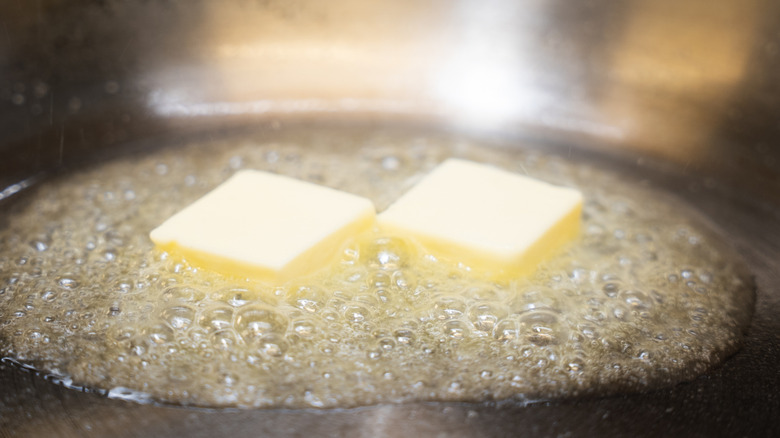 Butter melting and bubbling in a hot pan