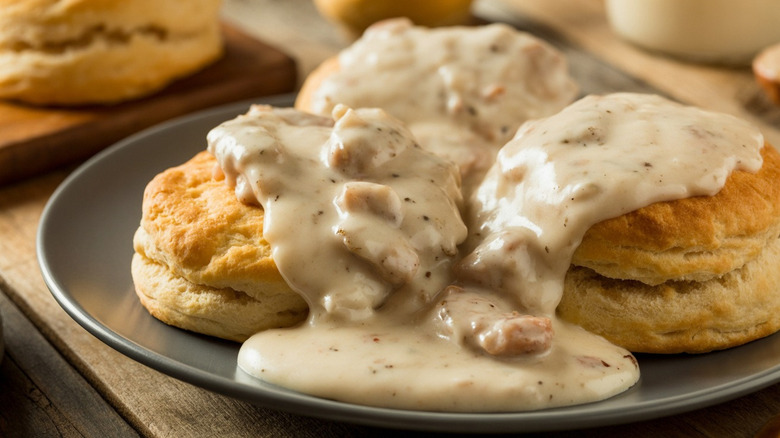Biscuits and sausage gravy on plate