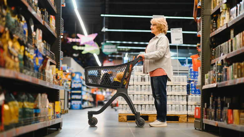 Senior woman shopping at a supermarket
