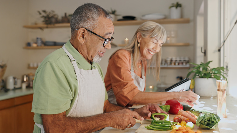 Senior couple cooking