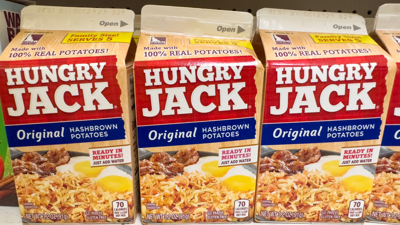 Cartons of Hungry Jack Original Hashbrown Potatoes on a store shelf