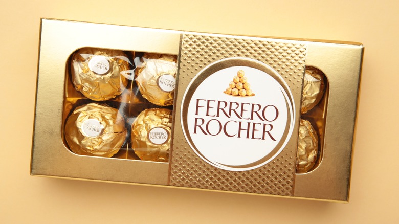 Box of Ferrero Rocher on a gold surface