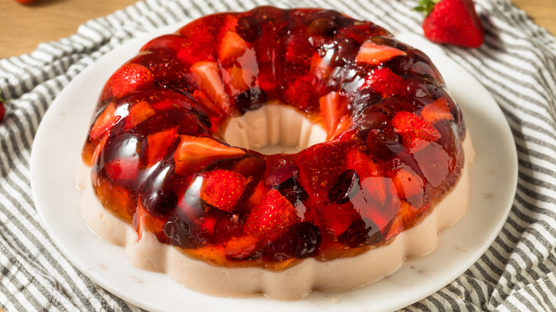 Layered berry gelatin on a white dish