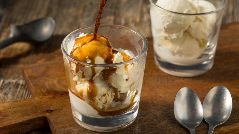 Pouring espresso over ice cream to make an affogato