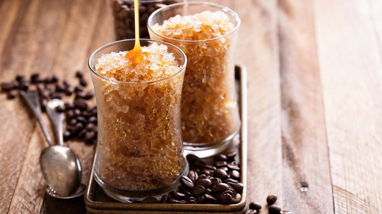 Glasses of coffee granita with caramel syrup