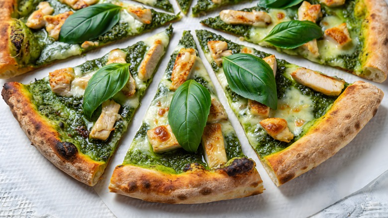Sliced chicken pesto pizza