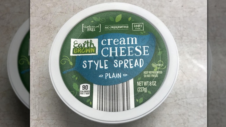 Container of Earth Grown Vegan Cream Cheese