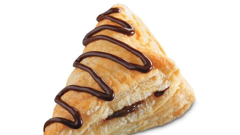 Puff pastry turnover drizzled with chocolate