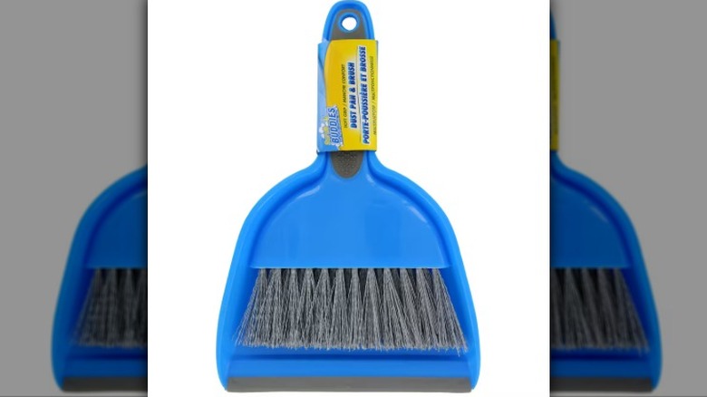The Home store mini nesting dustpan and brush set rests against a white background