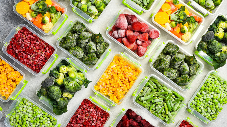 Assorted frozen vegetables in lidless airtight containers
