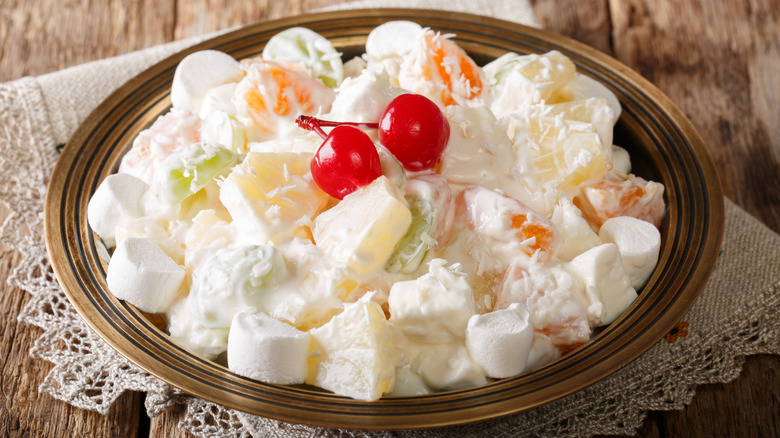 Plate of ambrosia salad with various fruits and marshmallows