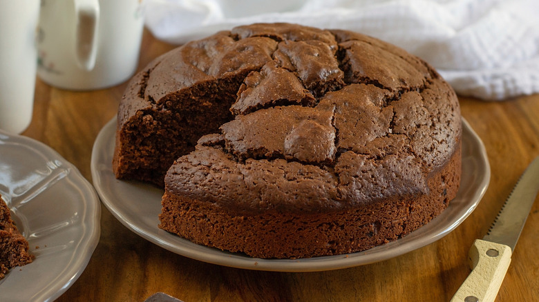 Fluffy chocolate mayonnaise cake on serving platter