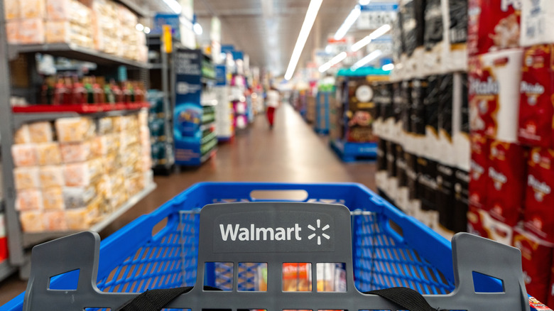 Walmart cart in an aisle