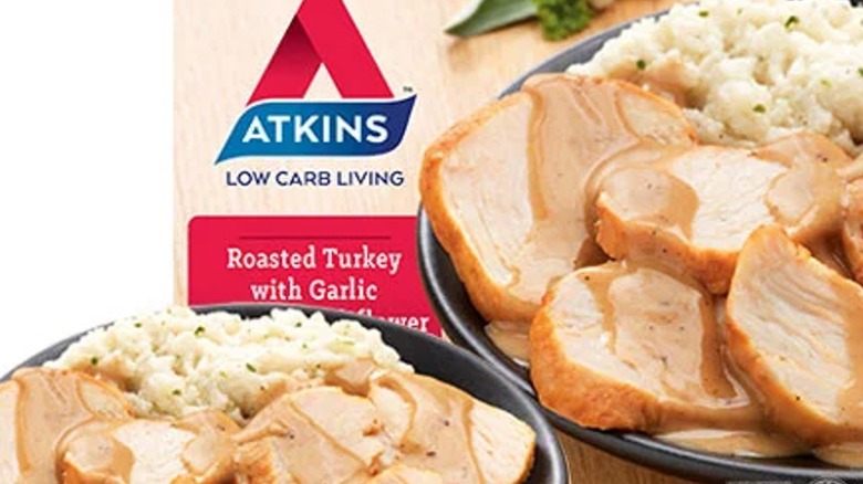 Atkins turkey dinner box and plate with cooked meal