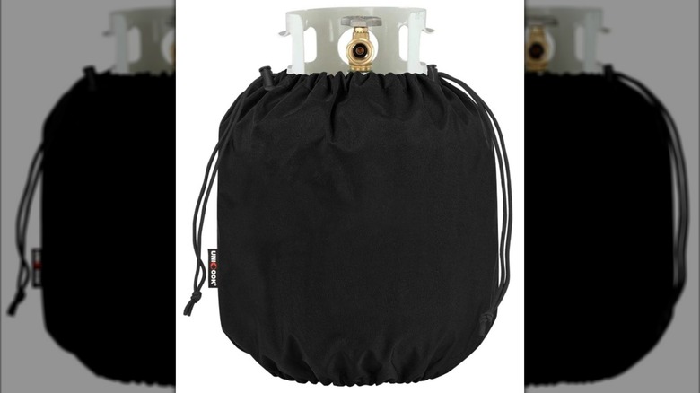 Black cover for a propane gas tank.