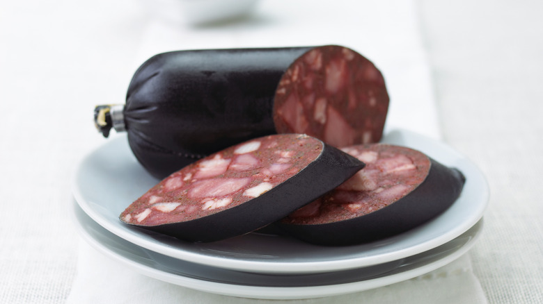 Sliced blutwurst on a white plate