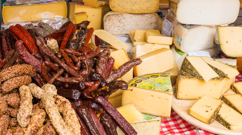 Landjager and other sausages and cheeses in store display