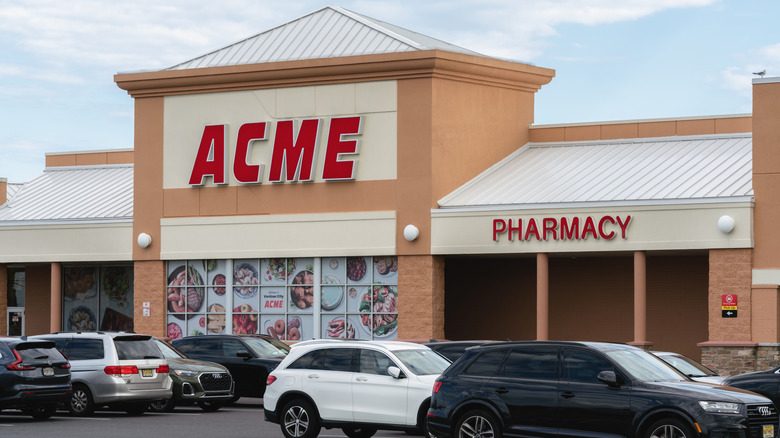 The exterior of Acme with cars parked outside